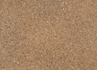 Large piece of corkboard suitable for use as background texture.The texture of the cork.