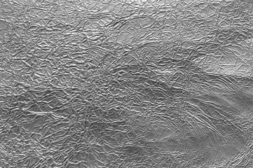 Foil background. Texture of crumpled foil.