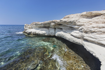 Fototapeta na wymiar Mediterranean sea. White rocks near Governor's beach