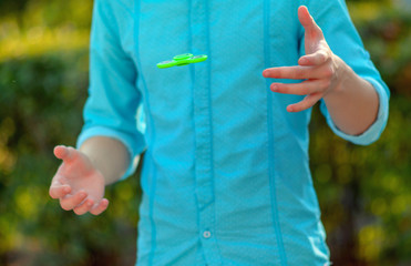 Teenager hand throws  antistress popular gadget fidget spinner