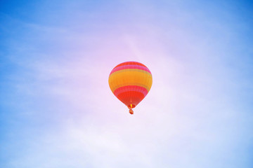 Fototapeta na wymiar balloon on the blue sky on morning.