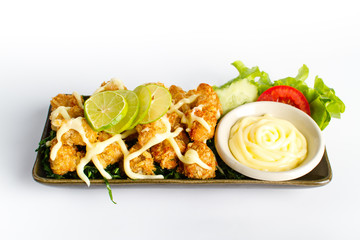 Crumb chicken with lime salad dressing