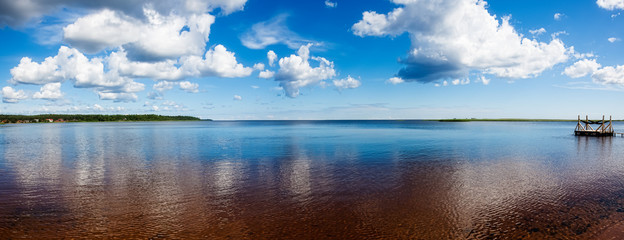 Panorama of Ladoga lake in summer Sunny day