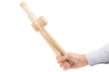Man's hand kitchen gavel and rolling pin