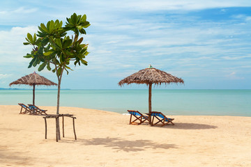 Naklejka na ściany i meble Beautiful tropical beach with parasols, Thailand