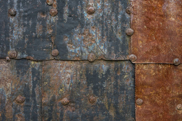 The old iron wall of a building