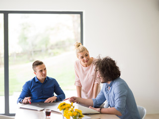 Startup Business Team At A Meeting at modern office building