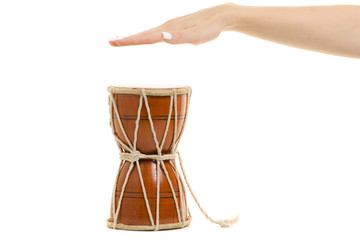 Fototapeta na wymiar Female hands little drum