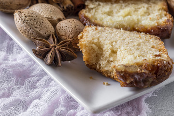 Homemade cinnamon cake and almonds