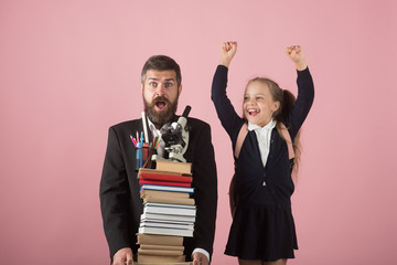 Teacher and schoolgirl with happy and surprised faces