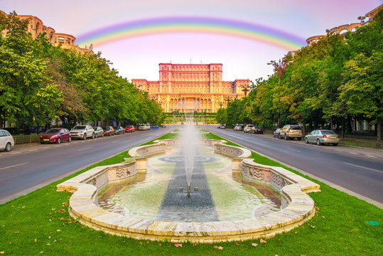 Beautiful rainbow above the famous building of Parliament, Bucharest, Romania