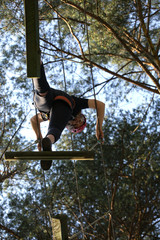  climbing in adventure rope park
