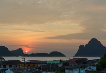 Fototapeta premium Nature background sunset or Sunrise over the mountains stones and the sea