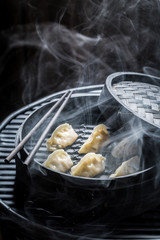 Closeup of chinese dumplings in bamboo steamer