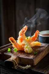 Poster Closeup of shrimp in tempura with sour sauce and sweet © shaiith