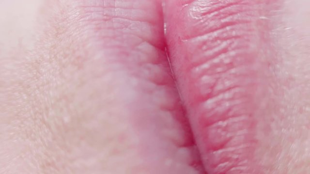 Extreme close up of woman smiling showing her teeth with teeth twinkle
