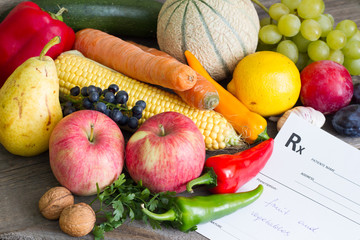 Healthy lifestyle concept with prescription fruits and vegetables 
