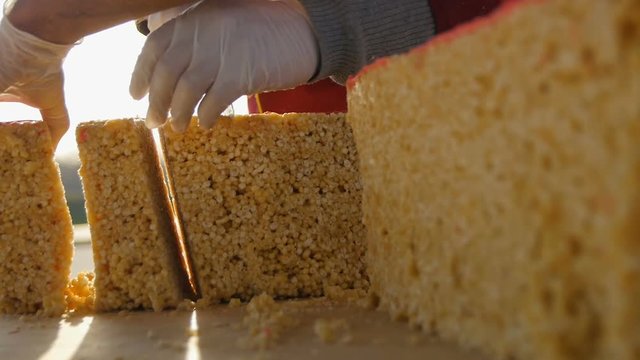 Closeup Seller Cuts into Pieces Asian Traditional Food