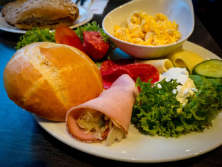 Breakfast with ham, Egg and green salad