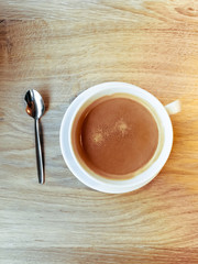 wonderful white cup of hot coffee on table