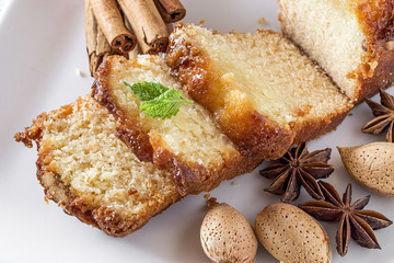 Homemade cinnamon cake and almonds