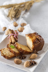 Homemade cinnamon cake and almonds
