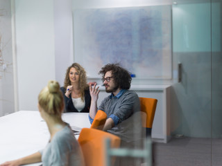 Startup Business Team At A Meeting at modern night office building