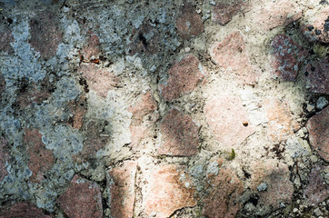 Old dirty road of granite light and shadow