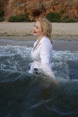 business woman on the sea beach