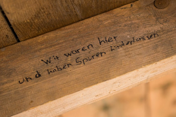 German Graffito "Wir waren hier und haben Spuren hinterlassen" (translation: We were here and left traces"