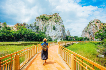 Fototapeta na wymiar Travel woman looking at beautiful landscape in Thailand.