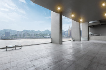 empty marble floor and cityscape of modern city