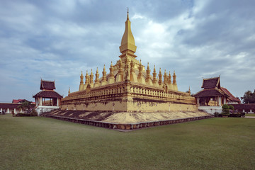 This is PhaThatLuang. It is a gold-covered large Buddhist stupa in the center of Vientiane, Laos.