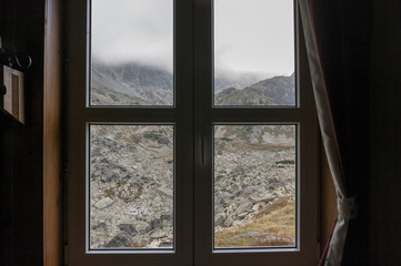 Window with a view of the mountains
