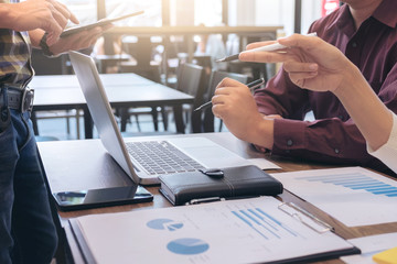 Startup business people group meeting, Young creative coworkers team working and discussing new plan project in office, entrepreneurs, brainstorming, Teamwork, analyze plans, professional investor