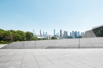empty marble floor and cityscape of modern city