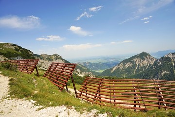 Fototapeta na wymiar Avalanche fence in the Tyrolean Alps in summer