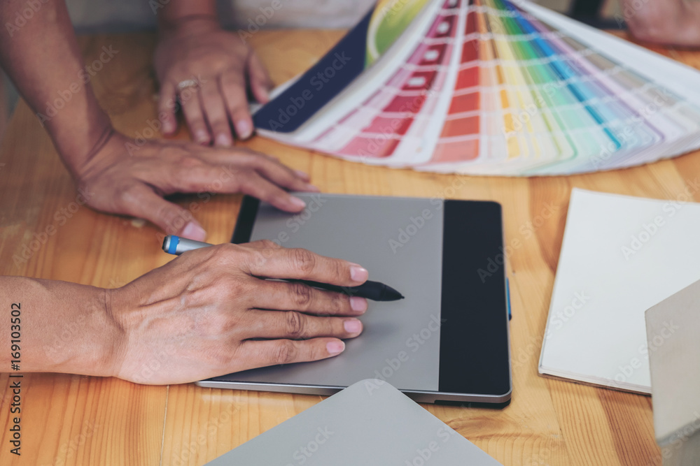 Poster young colleagues designers working together on a creative project and color samples for selection, c
