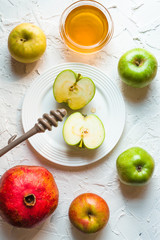 Pomegranate, apple in honey for the Jewish New Year