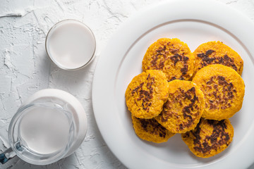 Vegetarian pancakes with white plate, jug and cup with hemp milk