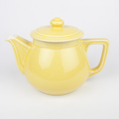 Théière en céramique jaune vintage