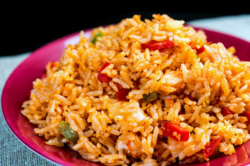 Homemade Chinese fried rice with vegetables and fried eggs