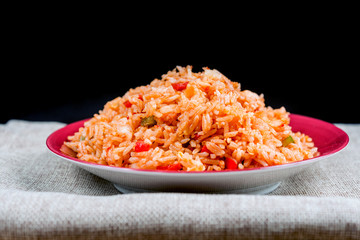 Homemade Chinese fried rice with vegetables and fried eggs