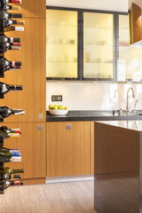 Wooden kitchen with wine