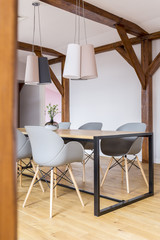 Dining table with grey chairs
