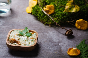 Groats with yellow mushroom cream sauce.