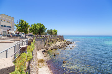 Alghero, Sardinia, Italy. The picturesque promenade and fortress walls