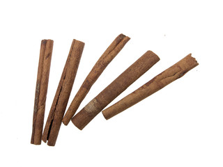 Cinnamon sticks on white background. The view from the top