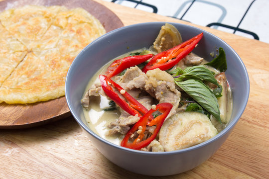 Beef green curry served with roti