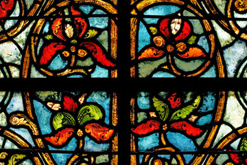Stained glass windows in St. Denis cathedral, Paris, France